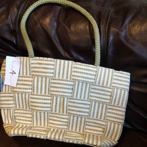 Alma Tonutti Italian Woven straw Handbag Made In Italy.

15x4x10